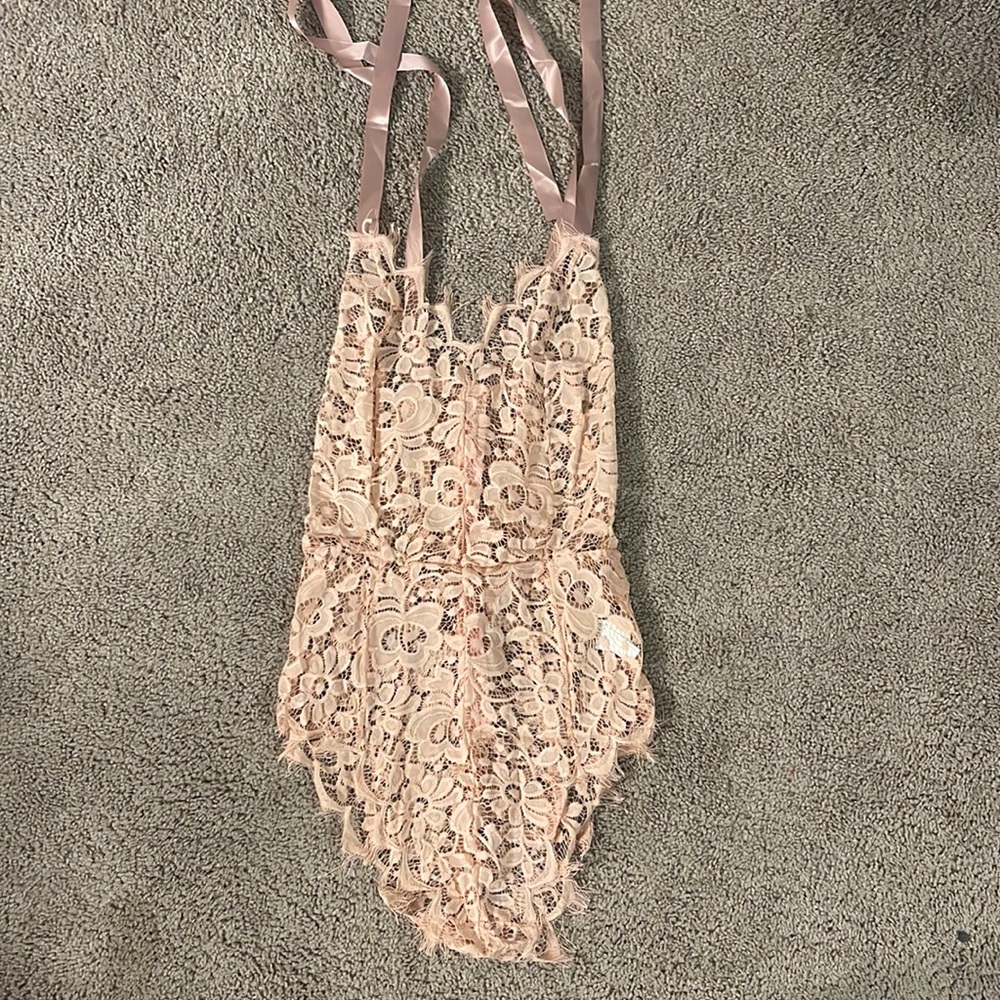 Pink lingerie bodysuit